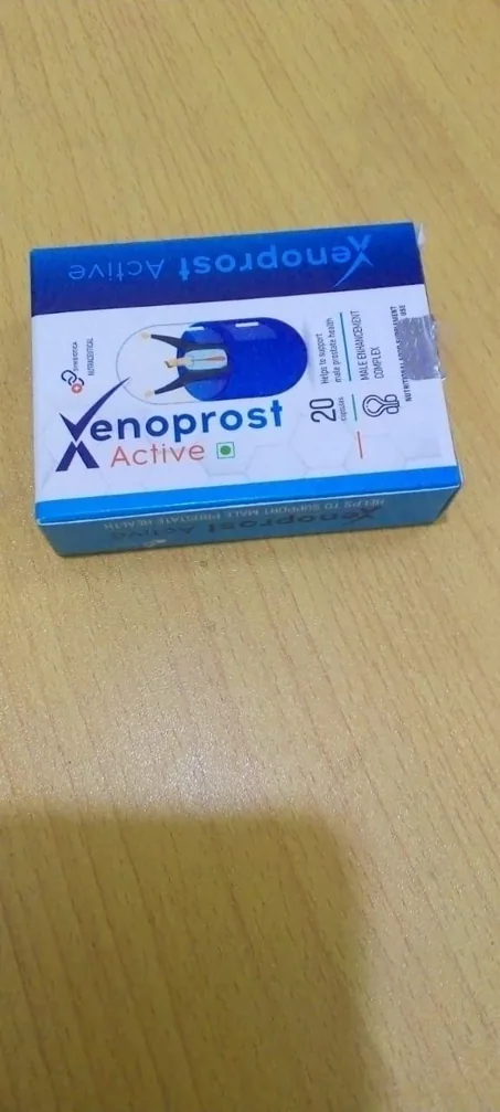 Xenoprost Active pack on a wooden table