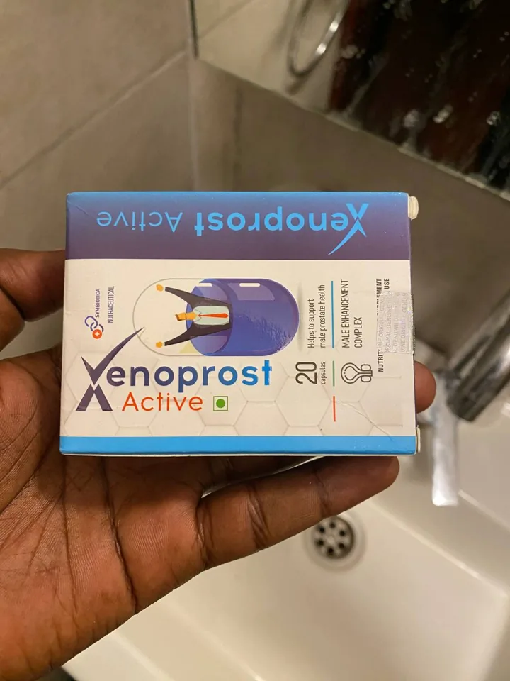 Xenoprost Active carton lying flat on an open hand